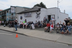Gang watching parade at club