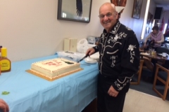 JC Faubert cutting cake