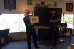 JC Faubert receiving award